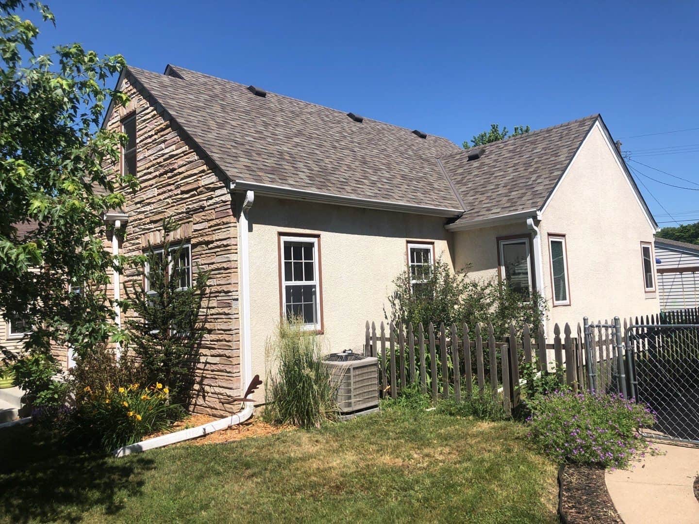 Side view of a St. Paul, MN home before its roof replacement