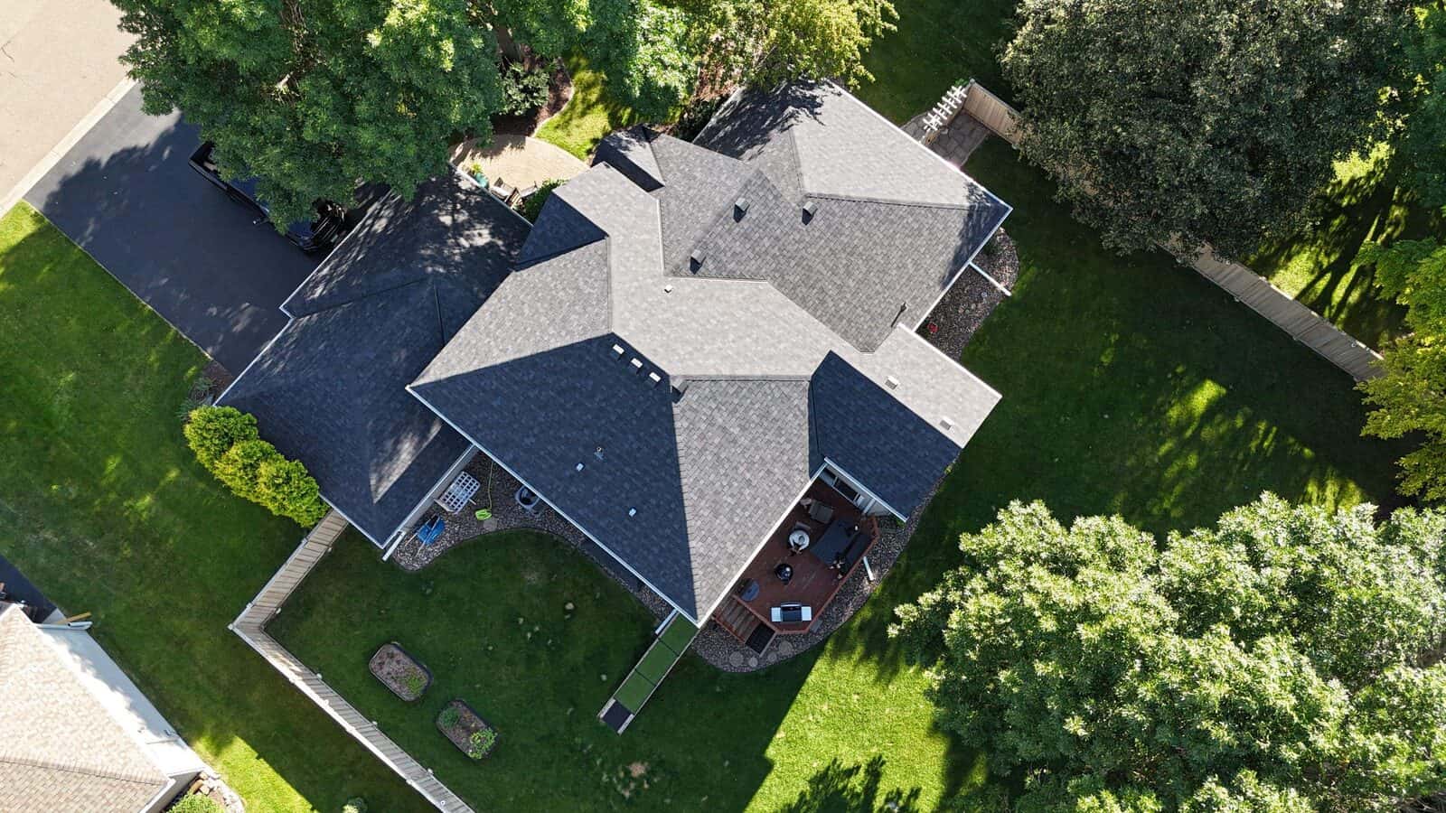 Aerial view of a completed Onyx Black roof replacement in Plymouth, MN
