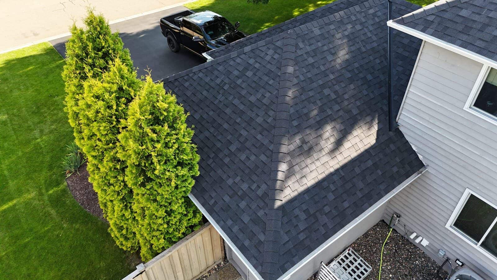 Drone detail of Owens Corning Duration shingles in Onyx Black in Plymouth, MN