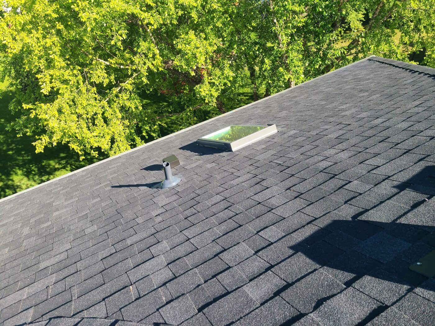 New Velux skylight installed in an Onyx Black shingle roof in Eden Prairie, MN