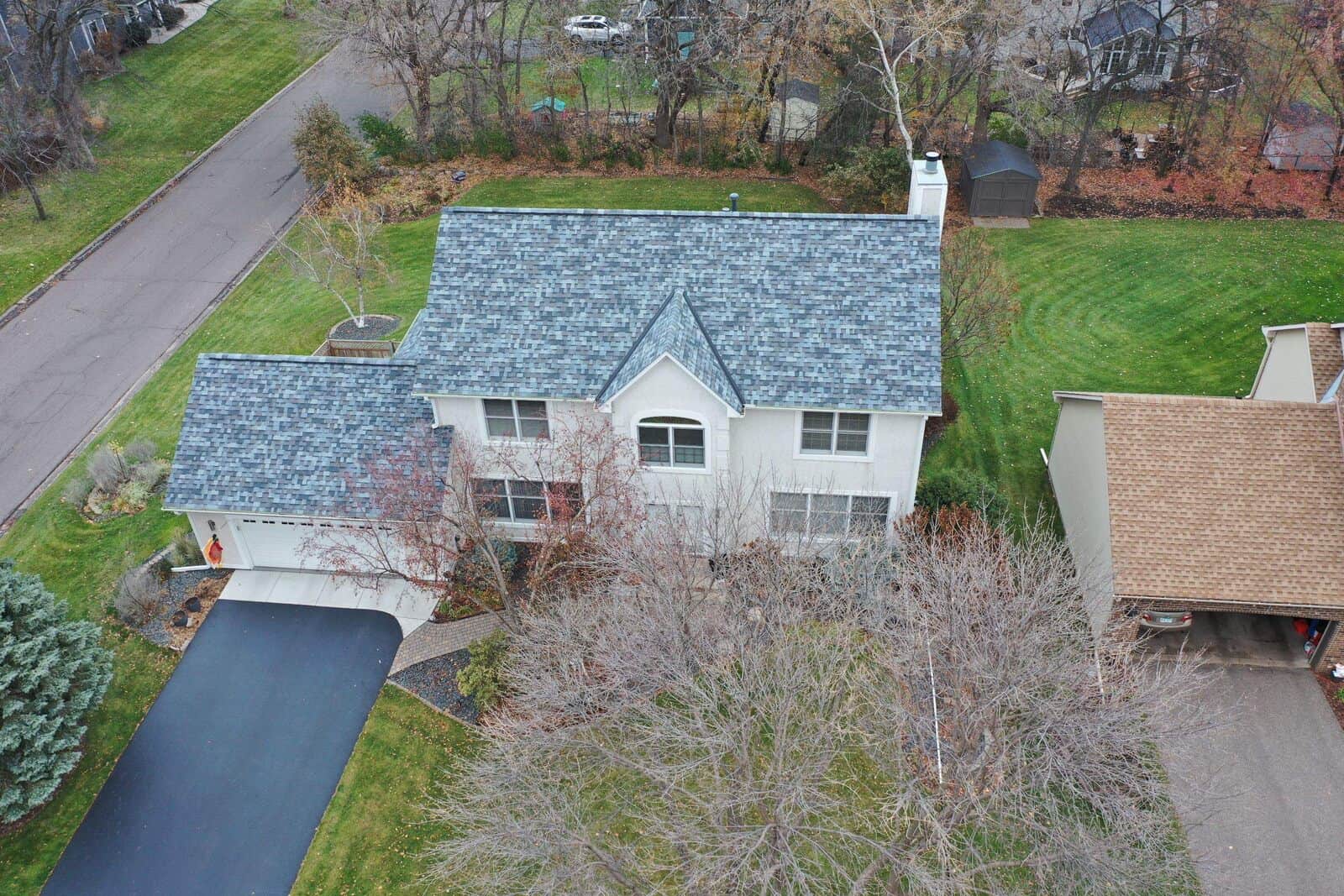 Aerial view of a new Owens Corning Duration roof in Pacific Wave on a Plymouth, MN home