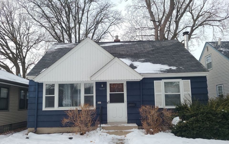 Minneapolis, MN home in winter before its roof replacement