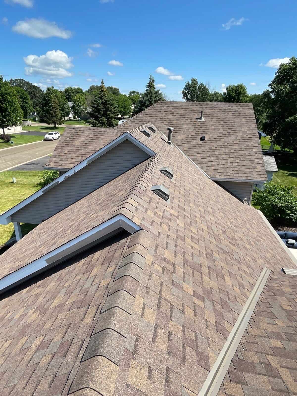 Close-up of Owens Corning Duration Teak shingles on an Andover, MN roof