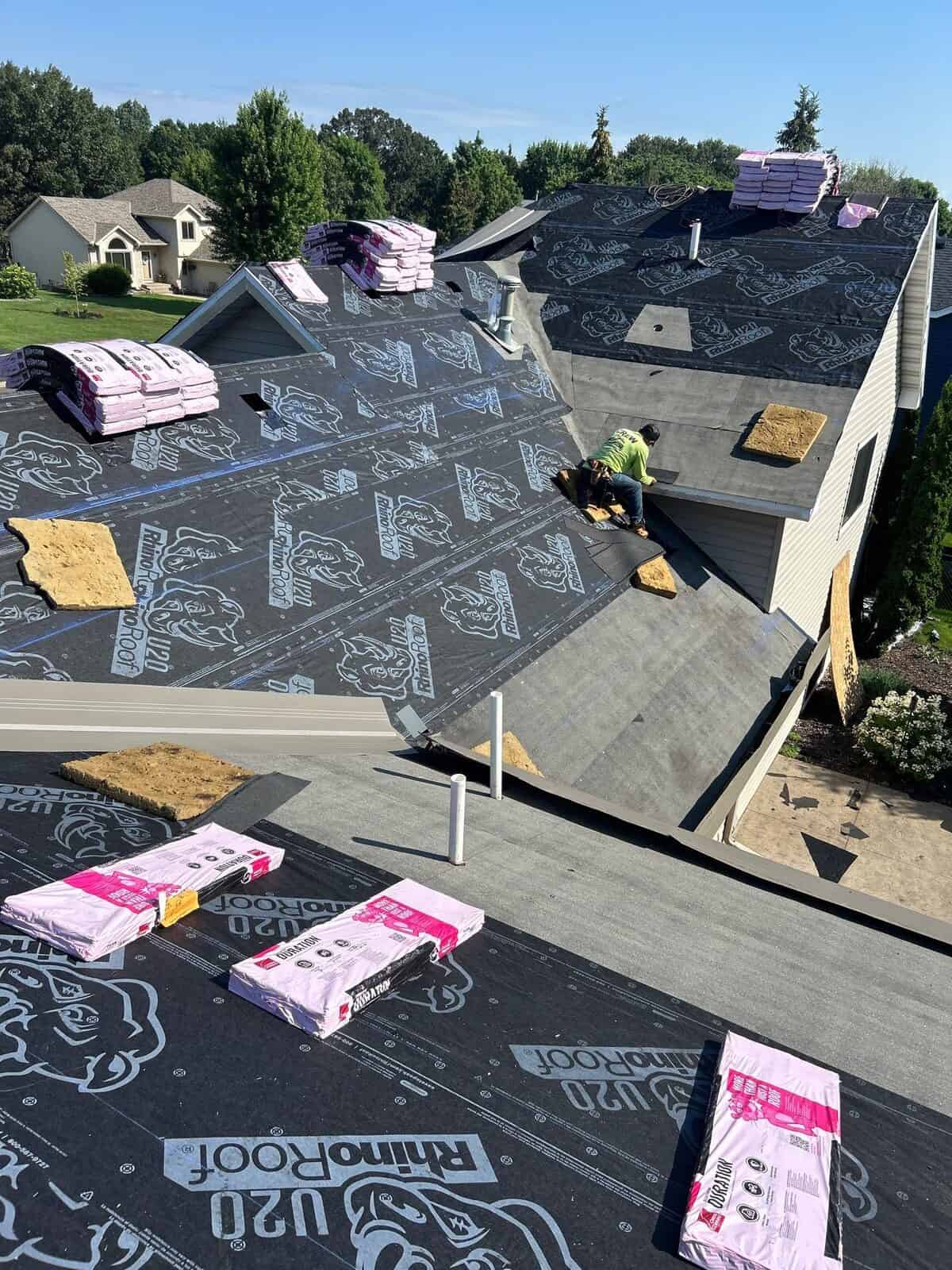 Roof underlayment and crew during an Andover, MN roof replacement
