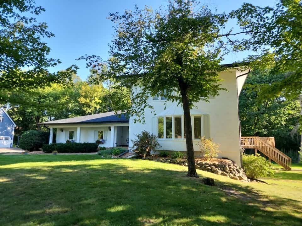 Plymouth, MN home after roof, gutter and soffit replacement with black trim