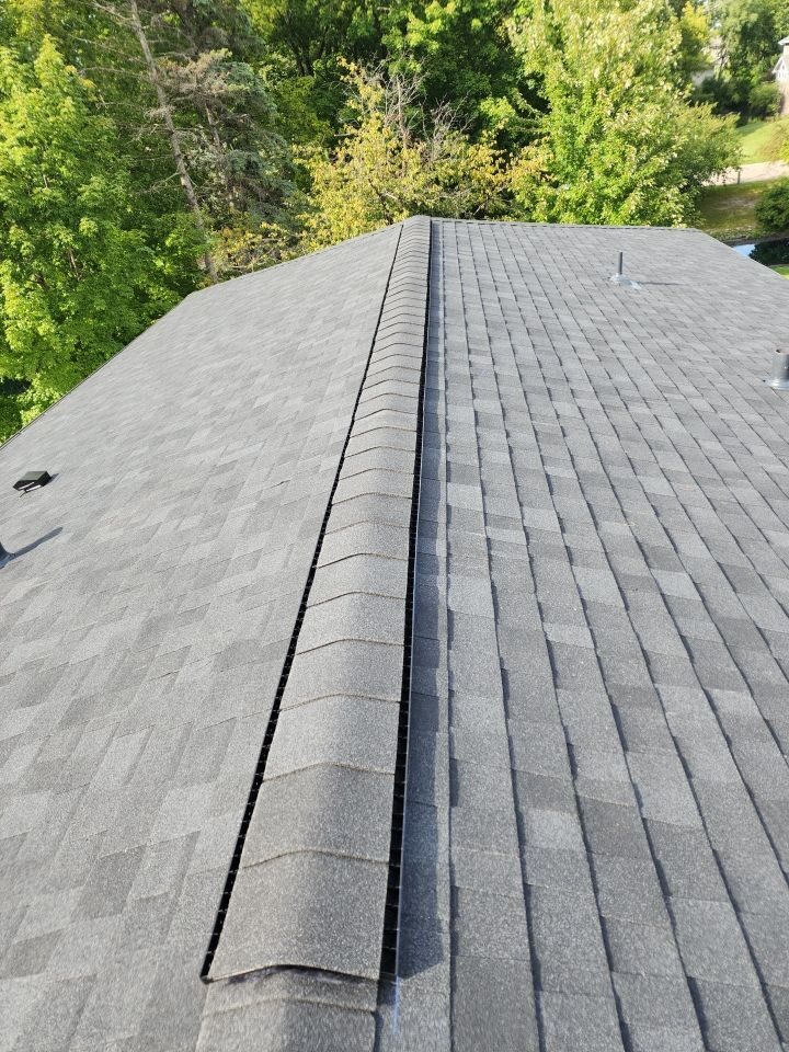 Close-up of Owens Corning Duration shingles in Onyx Black on a Plymouth, MN roof