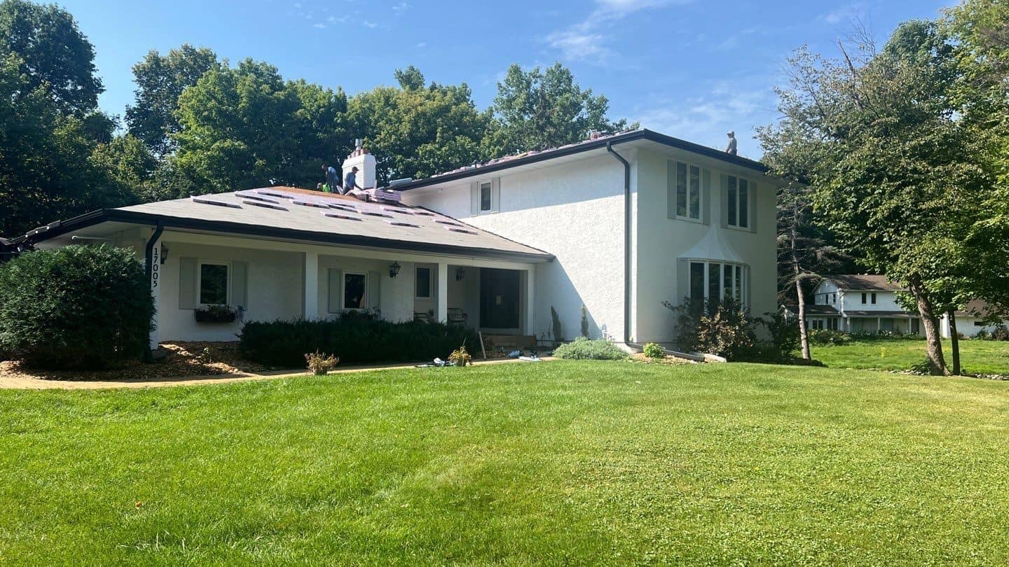 Roof replacement in progress on a Plymouth, MN home
