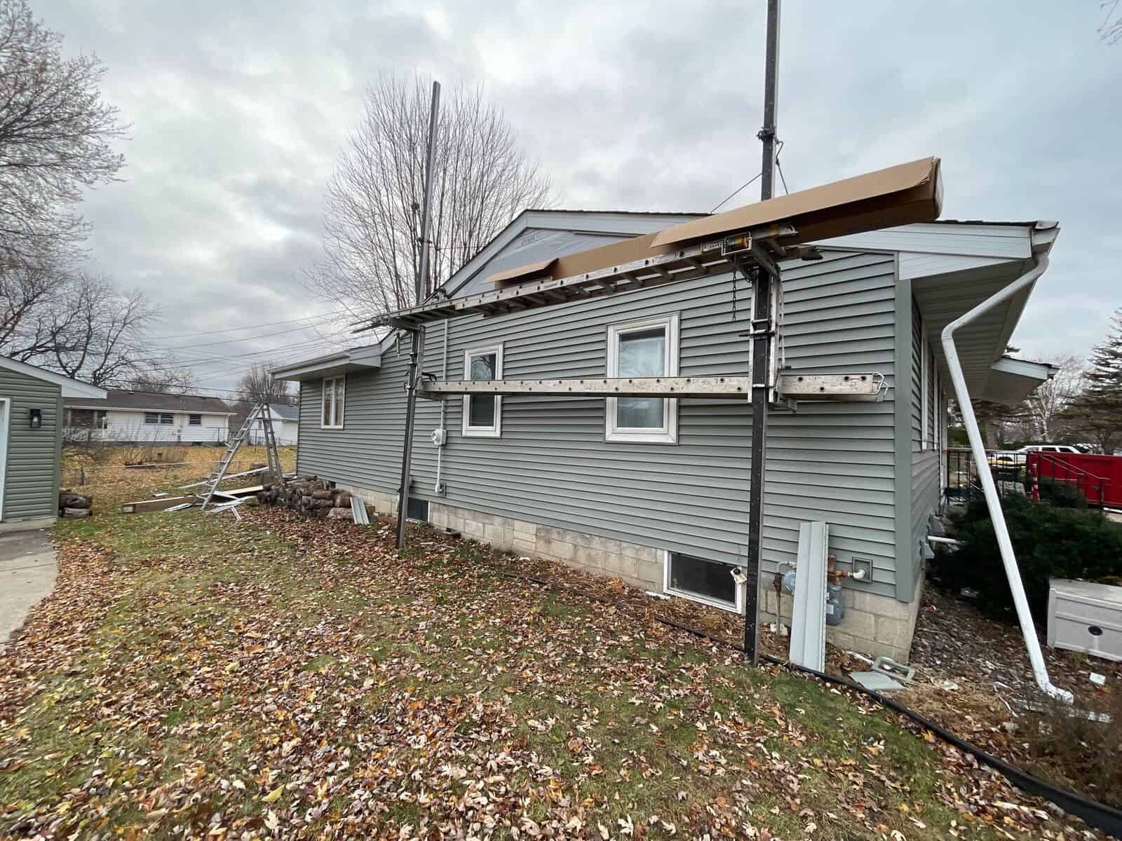 Old siding coming off a Crystal, MN home