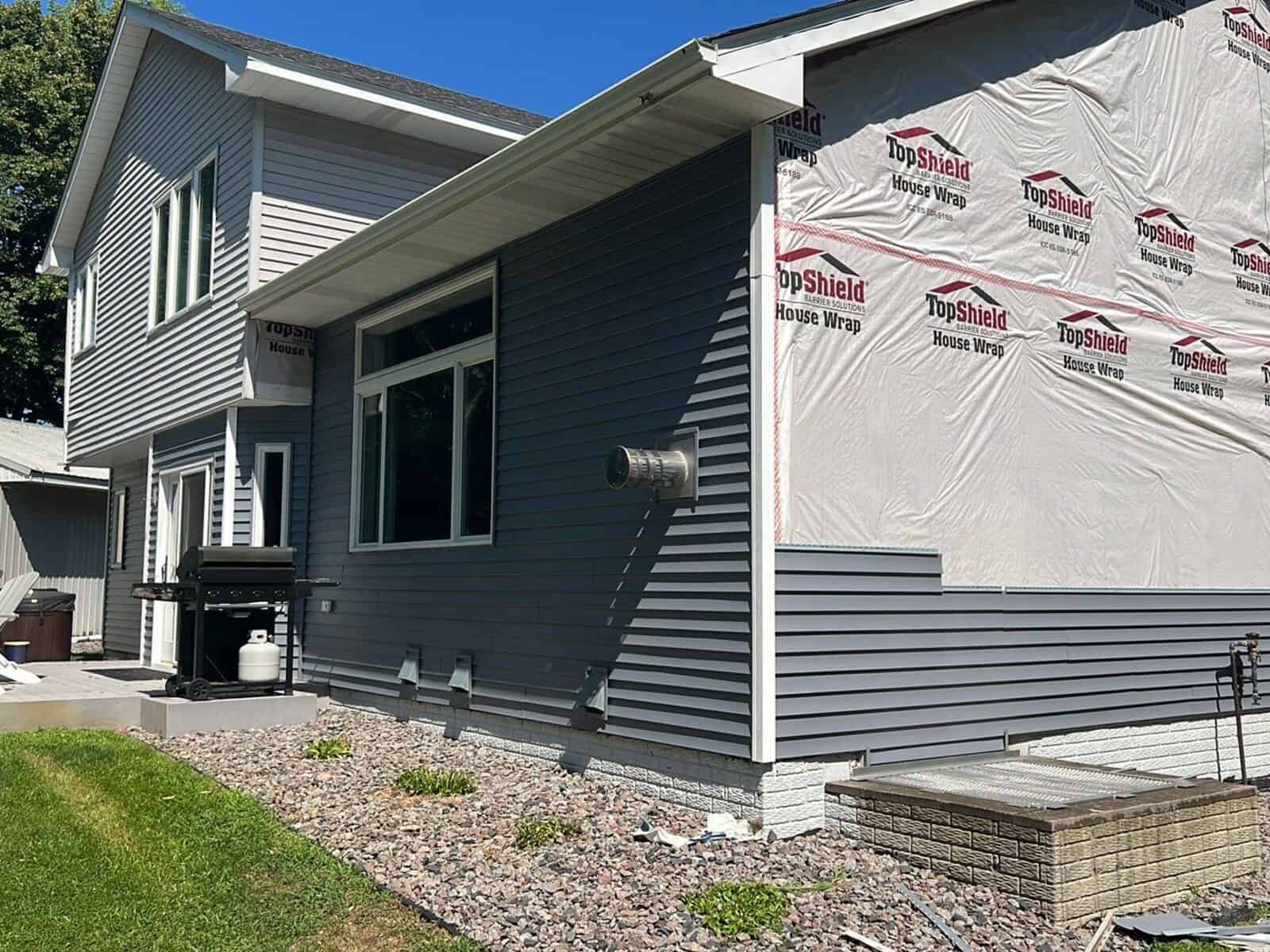 Annandale, MN home wrapped and ready for new siding