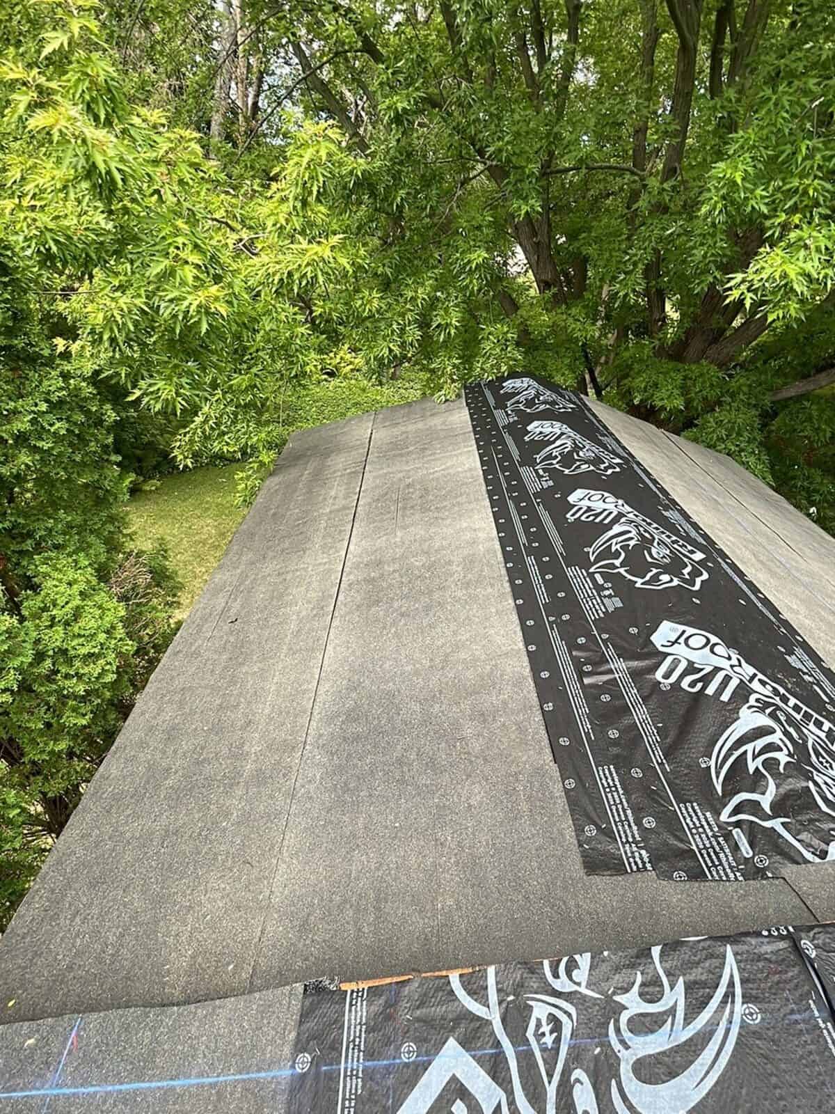 New underlayment at the ridge of a Little Canada, MN roof