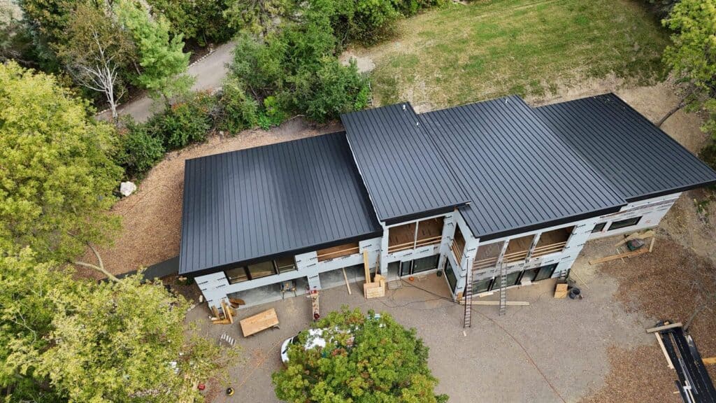 Aerial view of a new standing seam metal roof on a Delano, MN home