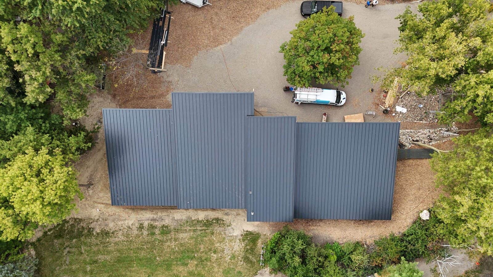 Top-down aerial view of standing seam metal roof panels in Delano, MN