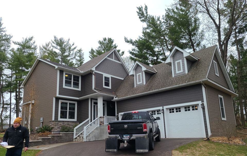 Front of a Chanhassen, MN home before its roof replacement