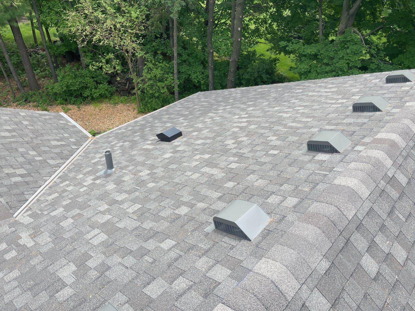 The old, weathered roof on a Chanhassen, MN home