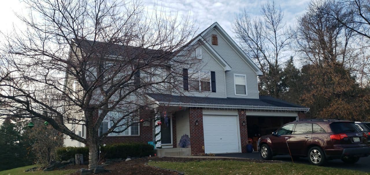 Chanhassen, MN home before its roof, siding, and gutter replacement