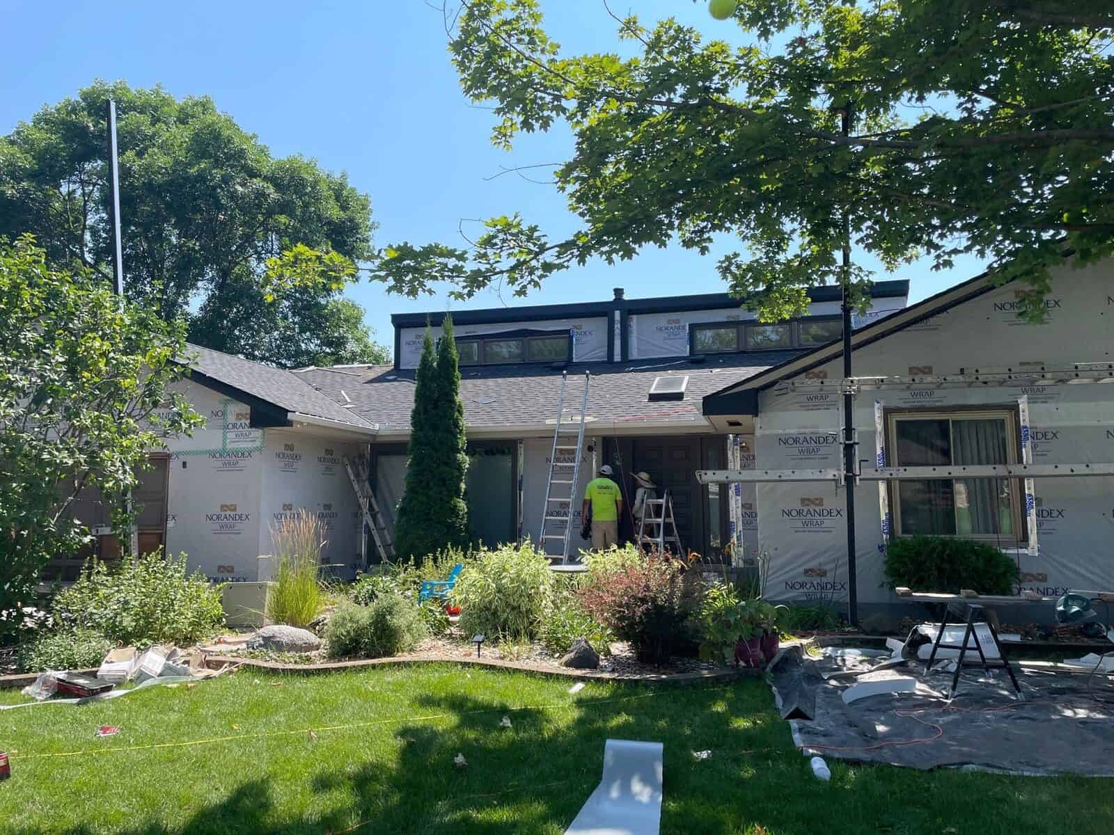 Plymouth, MN home before its roof, siding, window, and gutter remodel