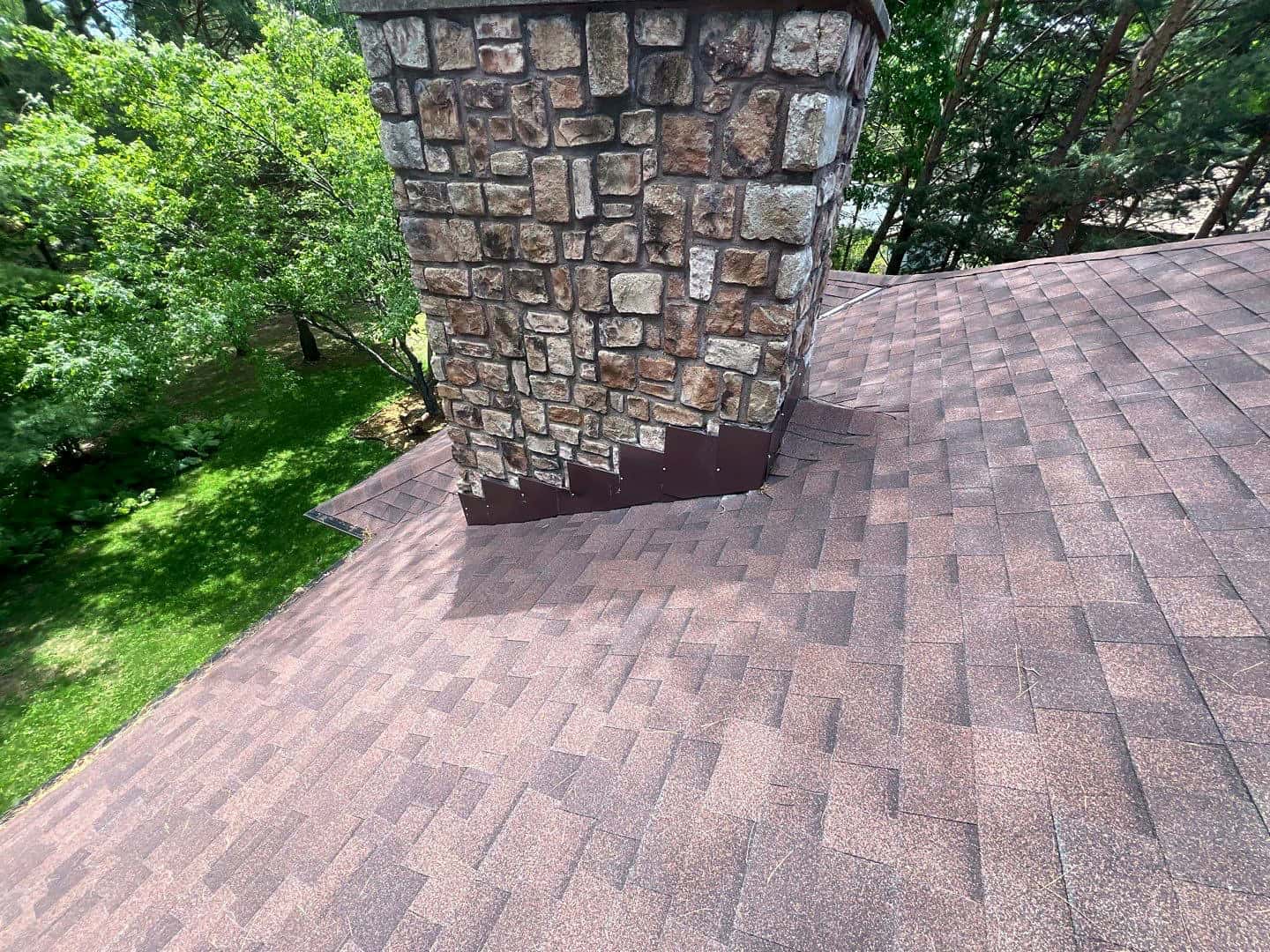 Finished chimney flashing and shingles