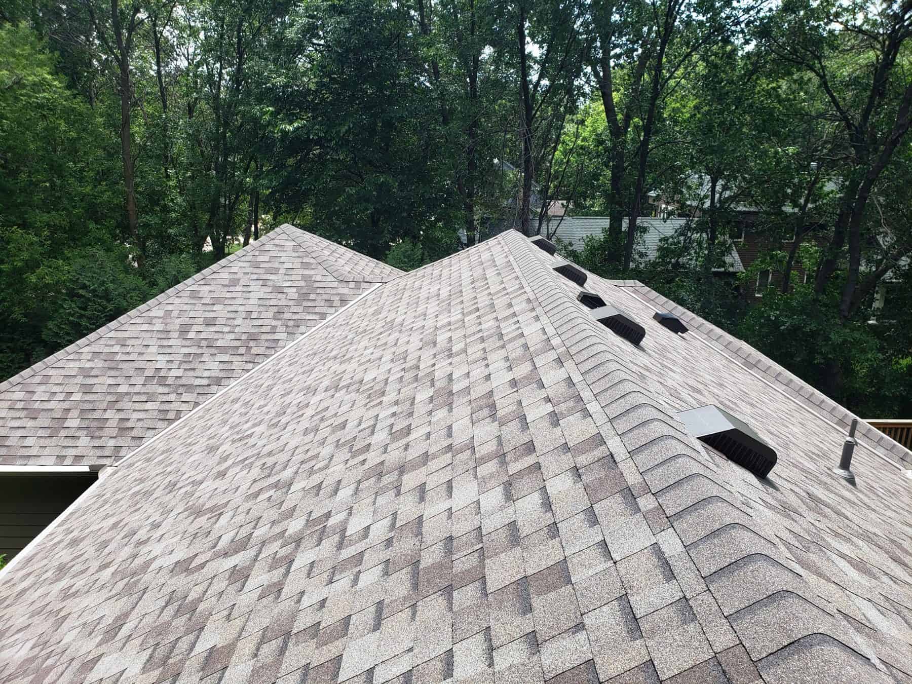 Minnetonka, MN home in the Bent Tree neighborhood from above with a new Owens Corning Duration roof in Driftwood