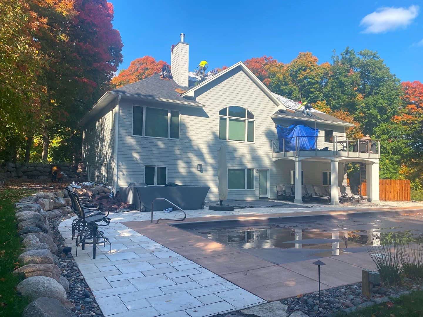 Rear of a Rockford, MN home during roof replacement with underlayment installed