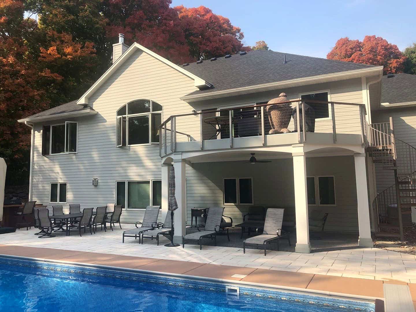 Finished GAF Timberline HDZ roof and patio at the rear of a Rockford, MN home