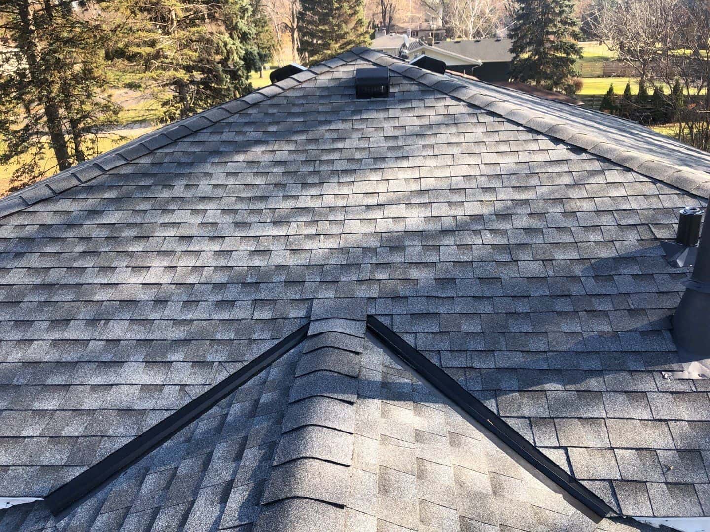 Ridge view of the finished Pewter Gray shingle roof