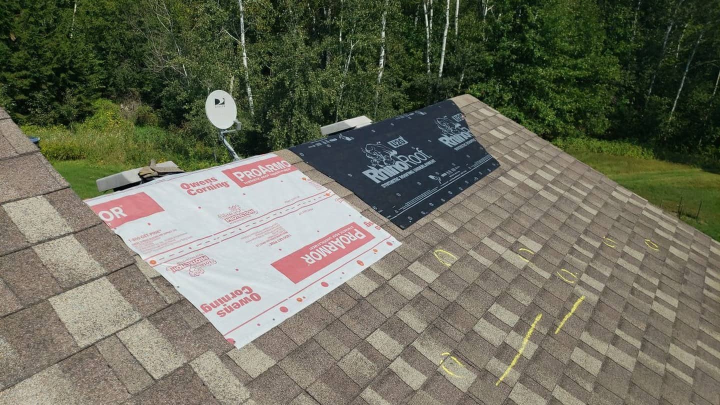 Documented hail damage on the old roof at the Stanchfield home