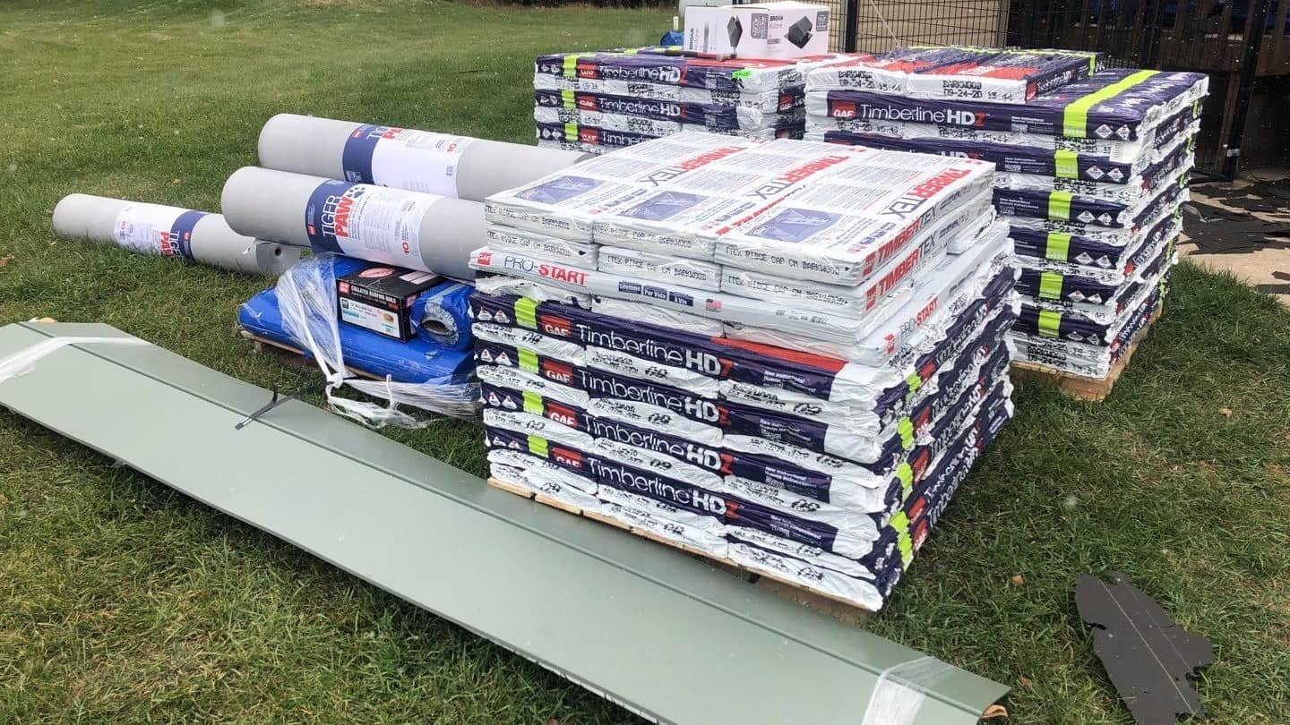 GAF Timberline HDZ shingles in Barkwood and Tiger Paw underlayment staged for the roof replacement